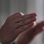 Conducting Surveys - A Person Wearing Gold Ring