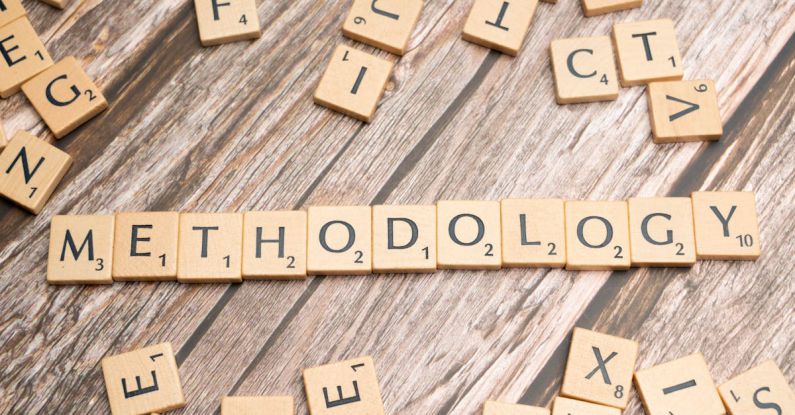 Research Techniques - The word methodology spelled out with scrabble tiles